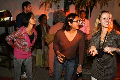 Guests dancing and laughing at a party