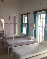 The women’s dormitory, with three beds