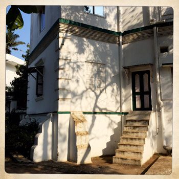 A corner of the house with an outside staircase